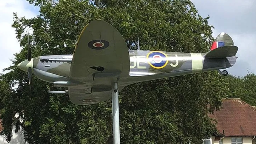Spitfire replica near road