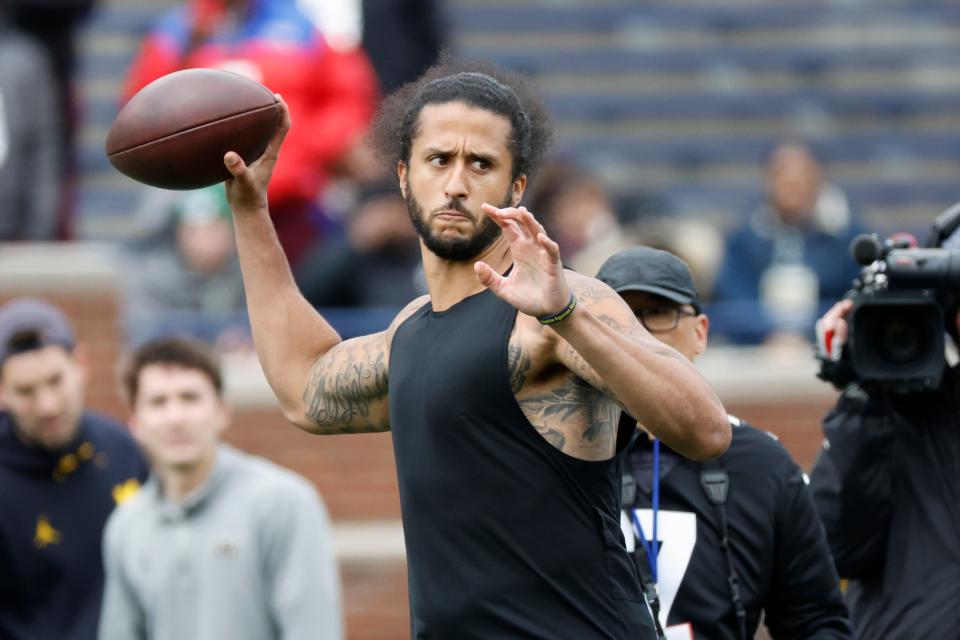 Colin Kaepernick passes during halftime at the Michigan Spring game at Michigan Stadium.