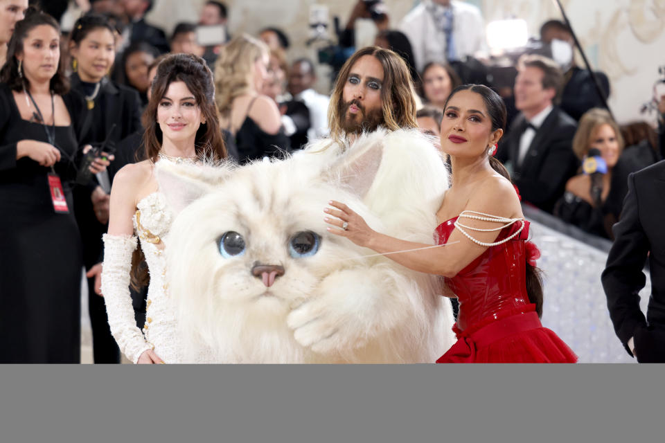 Anne Hathaway, Jared Leto, and Salma Hayek Pinault attend The 2023 Met Gala Celebrating 