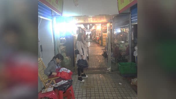 PHOTO: In photos shared exclusively with ABC News, caged raccoon dogs are seen being sold at the Wuhan wet market alongside poultry, rodents and snakes -- wildlife found in the same area of the market where positive Covid-19 samples were found in 2020. (Edward Holmes)