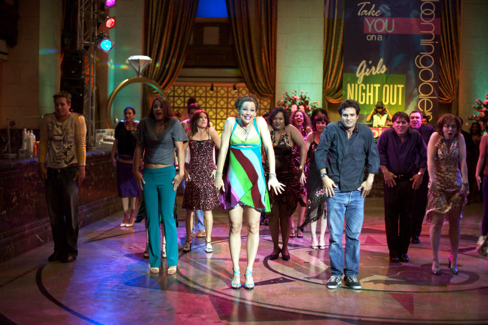 Jennifer Garner and Mark Ruffalo on a dance floor doing Michael Jackson's "Thriller" dance in a scene from "13 Going On 30"