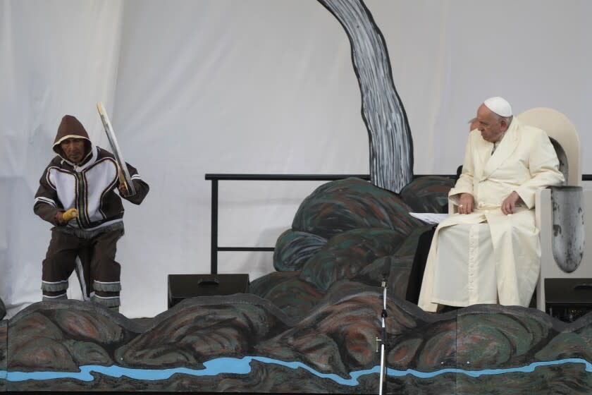 Pope Francis meets young people and elders at Nakasuk Elementary School Square in Iqaluit, Canada, Friday, July 29, 2022. Pope Francis travels to chilly Iqaluit, capital of northern Nunavut, to meet with Inuit Indigenous people, including school children and survivors of residential schools, in his final day in Canada. (AP Photo/Gregorio Borgia)