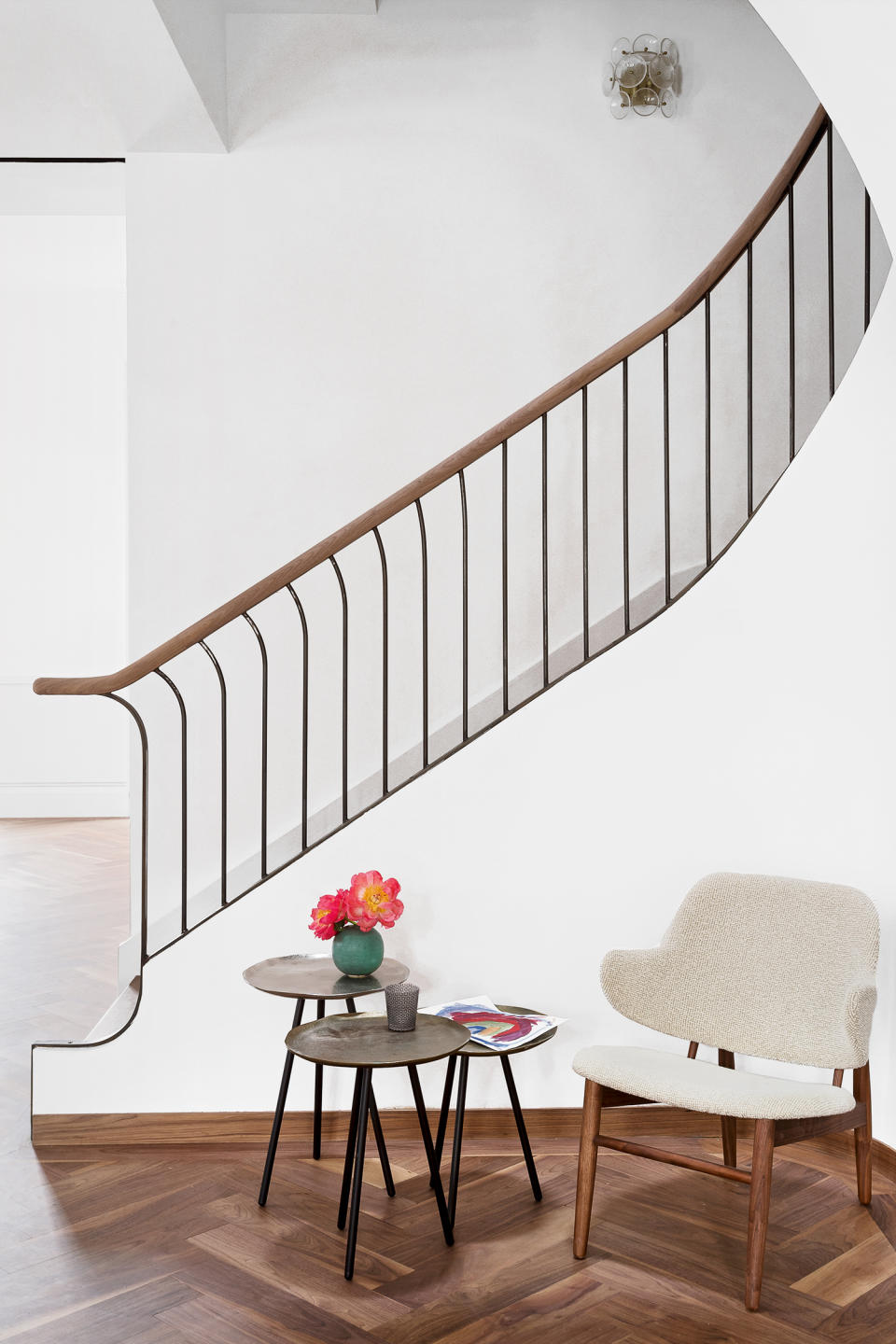 smooth staircase with black iron stair rail