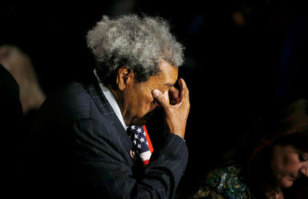 Promoter Don King wipes his eyes as he arrives for the funeral service. REUTERS/Lucas Jackson