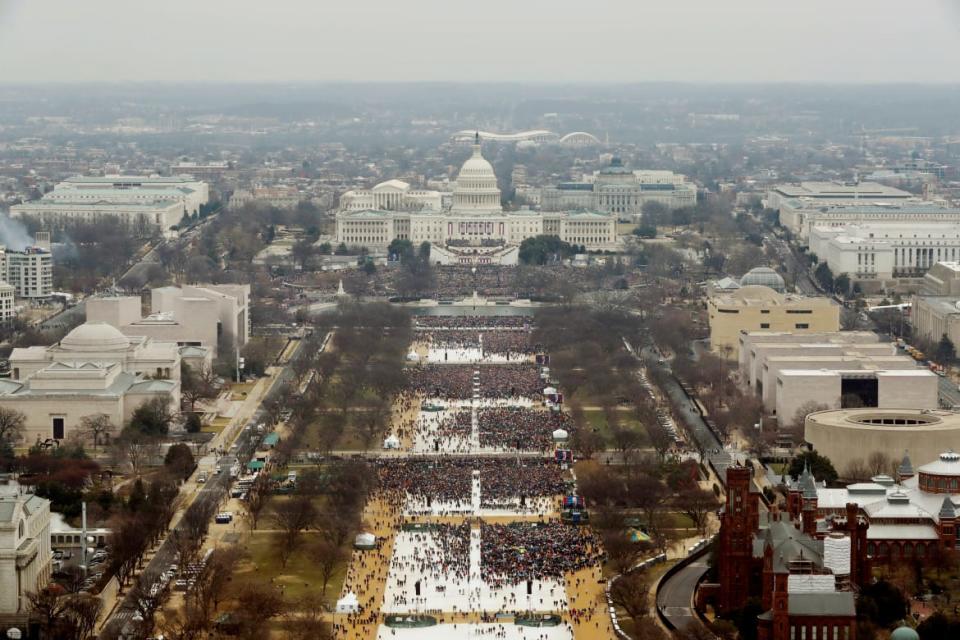 <div class="inline-image__caption"><p>Attendees partake in the inauguration ceremonies to swear in Donald Trump as the 45th president of the United States at the U.S. Capitol in Washington, U.S., January 20, 2017. </p></div> <div class="inline-image__credit">Lucas Jackson/Reuters</div>