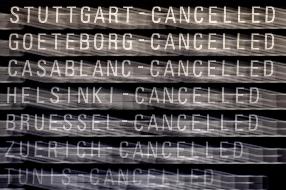 Cancelled flights are displayed on a board in a terminal at the airport in Frankfurt, Germany, Tuesday, Feb. 20, 2024. The trade union Verdi has once again called on Lufthansa ground staff to go on a warning strike. (AP Photo/Michael Probst)