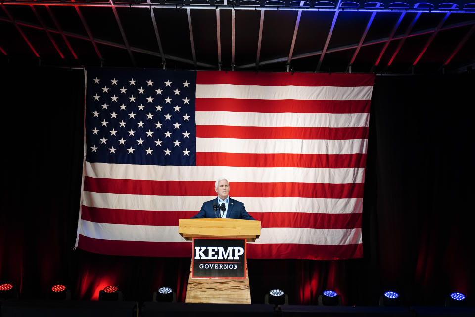 Former Vice President Mike Pence speaks on behalf of Georgia Gov. Brian Kemp during a rally, Monday, May 23, 2022, in Kennesaw, Ga. Pence is opposing former President Donald Trump and his preferred Republican candidate for Georgia governor, former U.S. Sen. David Perdue. (AP Photo/Brynn Anderson)