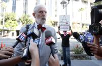 Gary Ruttenberg, a lawyer for Donald Sterling, talks to the media as he arrives at court in Los Angeles, California July 7, 2014. The $2 billion sale of the NBA's Los Angeles Clippers faces a key legal hurdle on Monday as the estranged husband and wife who own the franchise battle in court over control of the team. Shelly Sterling, 79, has asked a Los Angeles judge to confirm her as having sole authority to sell the pro basketball franchise to former Microsoft Corp chief executive Steve Ballmer at an NBA-record price after husband Donald Sterling vowed to block the deal. REUTERS/Lucy Nicholson (UNITED STATES - Tags: CRIME LAW SPORT BASKETBALL BUSINESS)