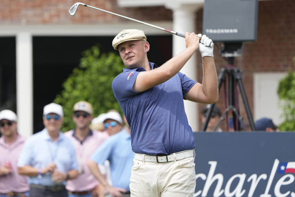 Harry Hall plays his shot from the 17th tee during the second round of the Charles Schwab Challenge golf tournament. Mandatory Credit: Jim Cowsert-USA TODAY Sports