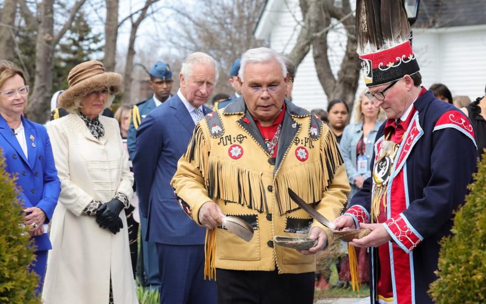 Charles and Camilla in the Heart Garden at Government House - Chris Jackson/PA