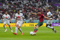 Portugal's Goncalo Ramos shoots and scores a goal during the World Cup round of 16 soccer match between Portugal and Switzerland, at the Lusail Stadium in Lusail, Qatar, Tuesday, Dec. 6, 2022. (AP Photo/Natacha Pisarenko)