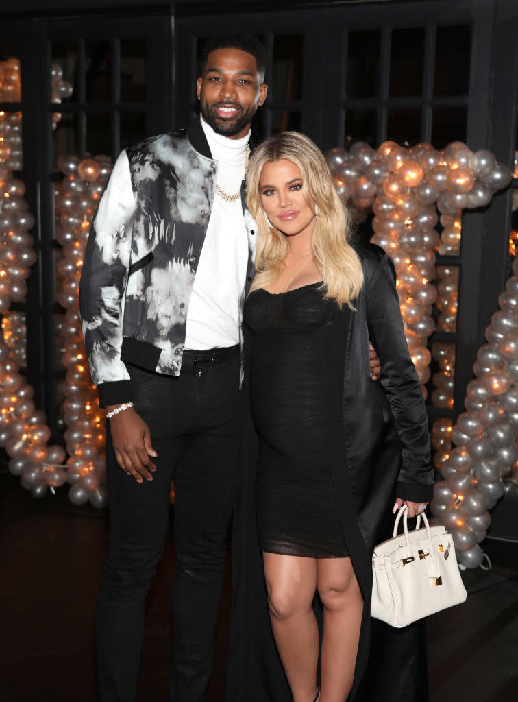 Smiling Tristan and Khloé embrace at his 2018 birthday bash