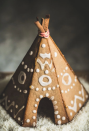 <p>If excessive decorating is not your thing, then you'll see this <em>tipi</em> made from gingerbread cookies is both manageable and adorable.</p><p><em><a href="http://www.bakingmagique.com/2014/12/gingerbread-tipi/#comment-568" rel="nofollow noopener" target="_blank" data-ylk="slk:See more at Baking Magique »;elm:context_link;itc:0;sec:content-canvas" class="link ">See more at Baking Magique »</a></em></p>