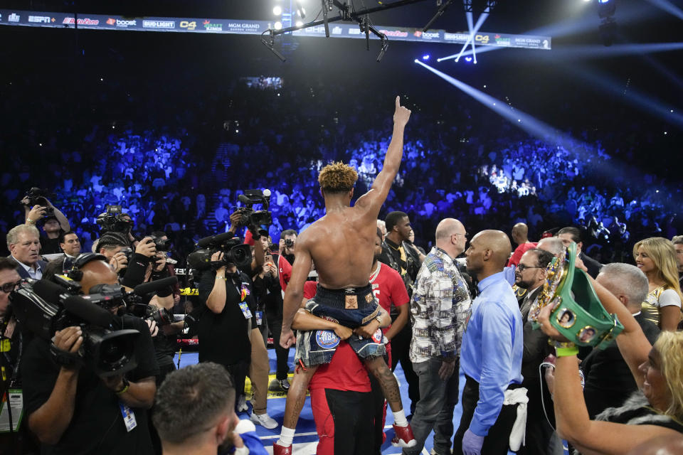 Devin Haney celebrates after defeating Vasiliy Lomachenko in an undisputed lightweight championship boxing match Saturday, May 20, 2023, in Las Vegas. Haney won by unanimous decision. (AP Photo/John Locher)