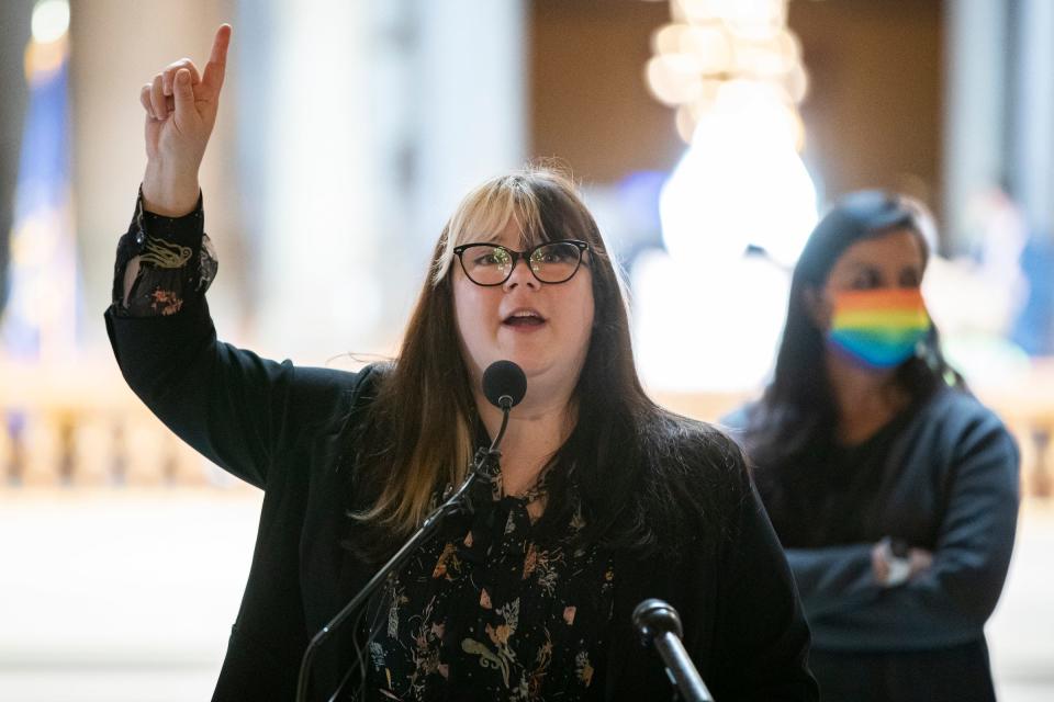 Katie Blair speaks during a "Let Kids Play" rally coordinated by ACLU Indiana on Wednesday, Feb. 9, 2022, at the Statehouse in Indianapolis. The Bloomington family has spoken publicly against the bill. 