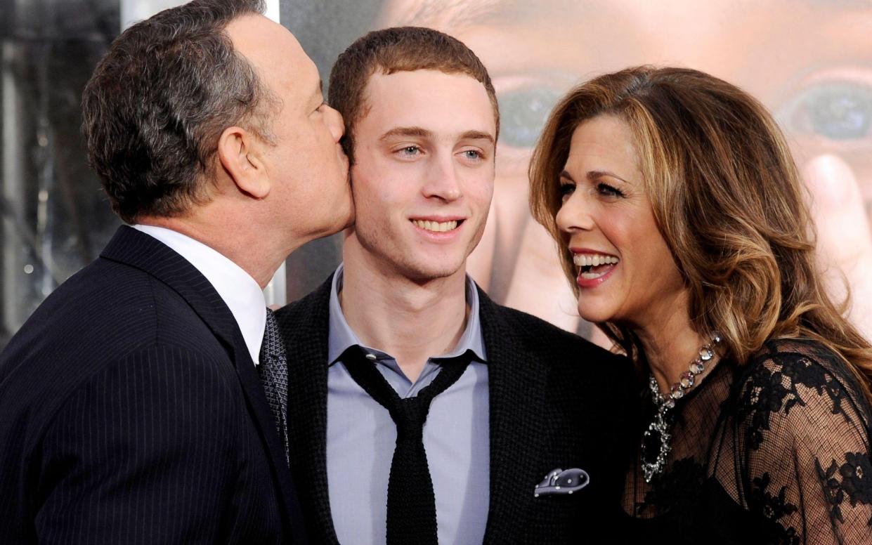 Chet Hanks with his father Tom, and his mother Rita Wilson - Alamy