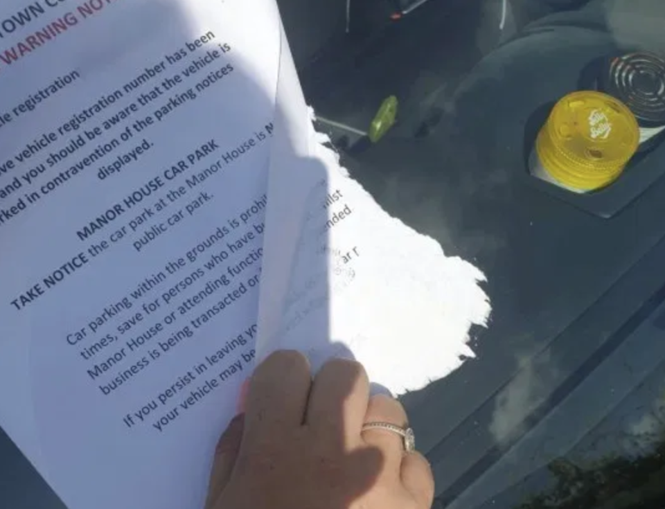 Workers from Dawlish Town Council reportedly glued the notice onto the windscreen. (SWNS)