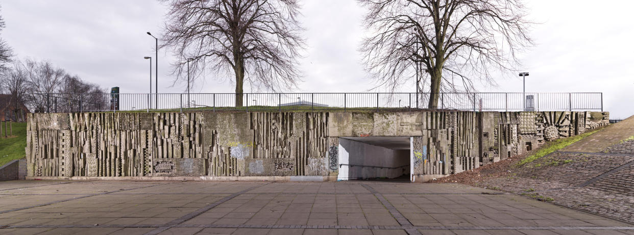 The murals in the pedestrian concourse of Hockley flyover in Birmingham, by sculptor William Mitchell, have been given listed status. (Historic England/ PA)