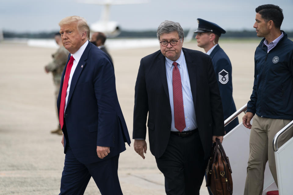 President Donald Trump, Attorney General William Barr and acting Homeland Security Secretary Chad Wolf arrive at Andrews Air Force Base after a trip to Kenosha, Wis., Tuesday, Sept. 1, 2020, at Andrews Air Force Base, Md. (AP Photo/Evan Vucci)