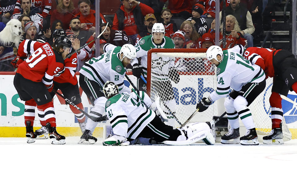 Dallas Stars goaltender Scott Wedgewood (41) makes a save against the New Jersey Devils during the first period of an NHL hockey game Saturday, Jan. 20, 2024, in Newark, N.J. (AP Photo/Noah K. Murray)