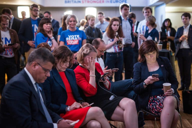 Supporters of the 'Stronger In' Campaign react as results of the EU referendum are announced at a results party at the Royal Festival Hall in London