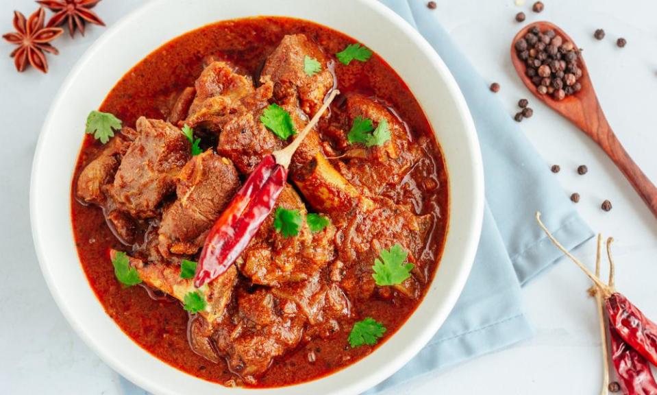 Authentic lamb Vindaloo traditional fiery red Goan curry of lamb.