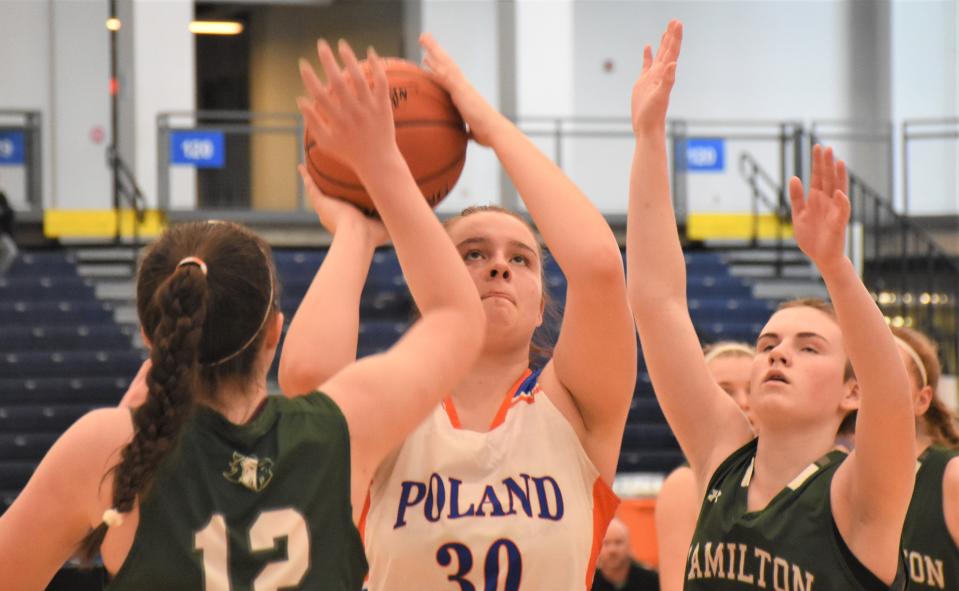 Poland's Sydney Tabor (30), a tournament all-star selection, looks for room to shoot against Hamilton Saturday during Section III's Class D final at SRC Arena.