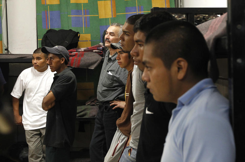 Dozens of immigrants, many of them Mexican citizens, gather in sleeping quarters at a well known immigrant shelter, as many are making tough decisions on whether to try their luck at trying to make it to the United States, by illegally crossing the border, Thursday, Aug. 9, 2012, in Nogales, Mexico. The U.S. government has halted flights home for Mexicans caught entering the country illegally in the deadly summer heat of Arizona's deserts, a money-saving move that ends a seven-year experiment that cost taxpayers nearly $100 million.(AP Photo/Ross D. Franklin)