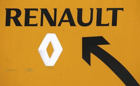 A Renault sign is seen near their Flins automobile plant in Aubergenville, France, January 17, 2016. REUTERS/Jacky Naegelen