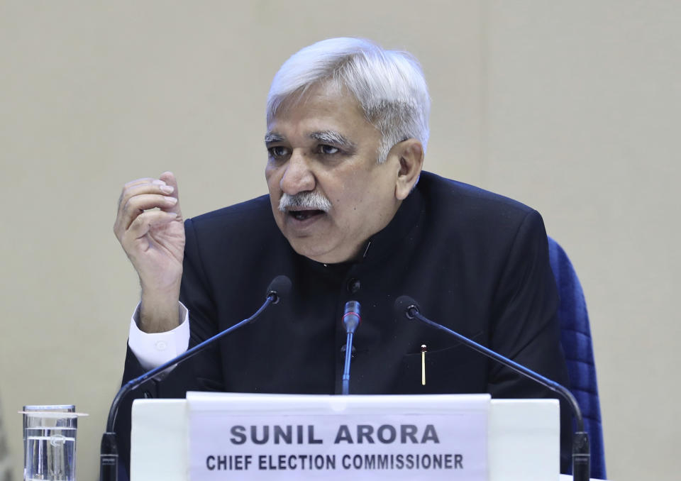 India's Chief Election Commissioner Sunil Arora speaks during a press conference in New Delhi, India, Sunday, March 10, 2019. India's Election Commission has announced that the upcoming national election will be held in seven phases in April and May as Prime Minister Narendra Modi's Hindu nationalist party seeks a second term. (AP Photo/ Manish Swarup)