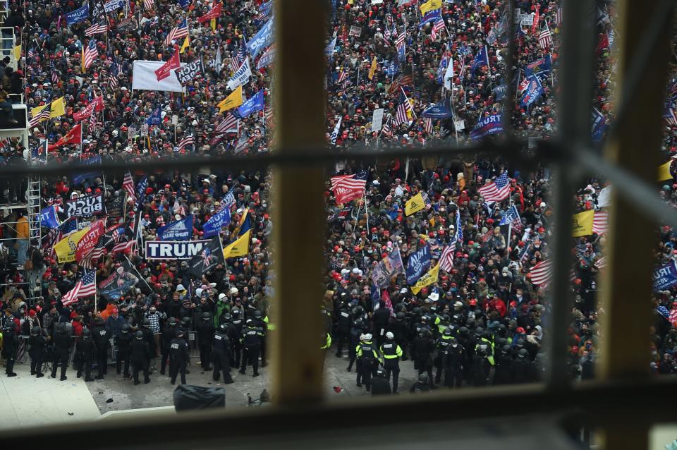 Supporters of US President Donald Trump gather outside the US Capitol's Rotunda on January 6, 2021, in Washington, DC. Demonstrators breeched security and entered the Capitol as Congress debated the a 2020 presidential election Electoral Vote Certification.