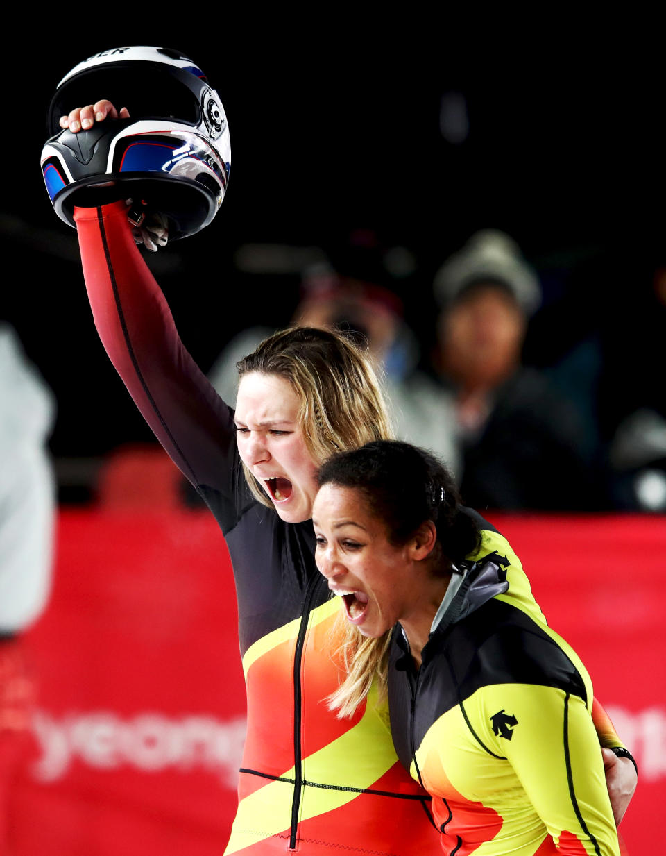 <p>Gold medalists Mariama Jamanka and Lisa Buckwitz of Germany celebrate in the finish area during the Women’s Bobsleigh heats at the PyeongChang 2018 Winter Olympic Games on February 21, 2018.<br> (Photo by Clive Mason/Getty Images) </p>