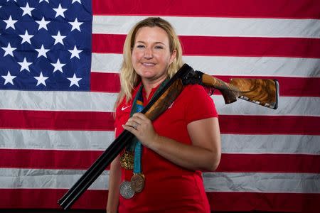 Shooting athlete Kim Rhode poses for a portrait during the 2012 U.S. Olympic Team Media Summit in Dallas, Texas May 14, 2012. REUTERS/Lucas Jackson/File Photo