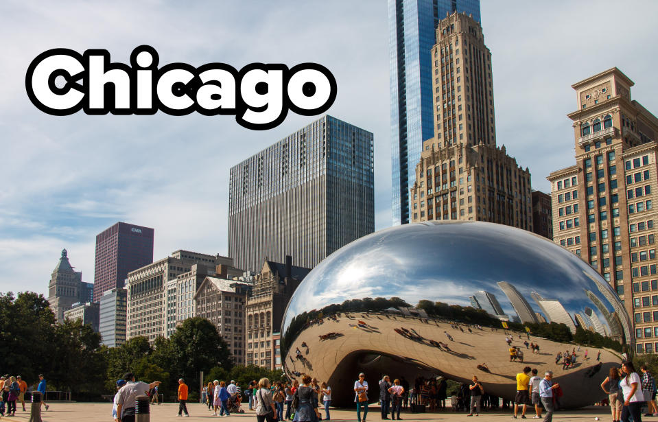 Cloud Gate sculpture in Millennium Park, Chicago, with people gathered around and city skyscrapers in the background