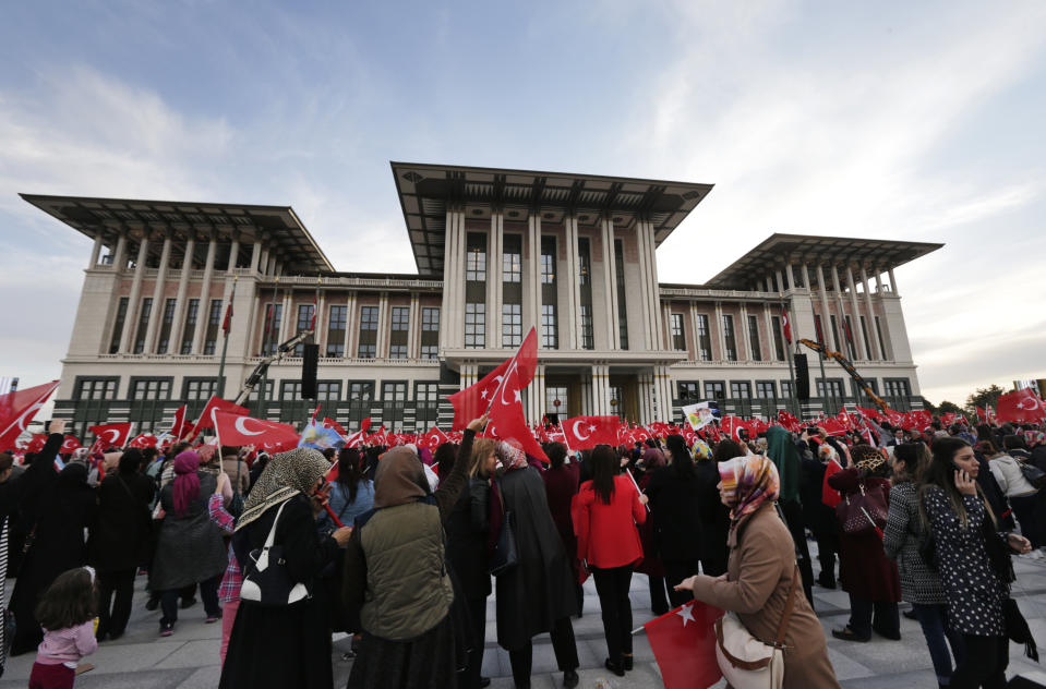 Supporters of Turkey's President Recep Tayyip Erdogan gather for a rally outside the Presidential Palace, in Ankara, Turkey, Monday, April 17, 2017, one day after the referendum. Turkey's main opposition party urged the country's electoral board Monday to cancel the results of a landmark referendum that granted sweeping new powers to Erdogan, citing what it called substantial voting irregularities. (AP Photo/Burhan Ozbilici)