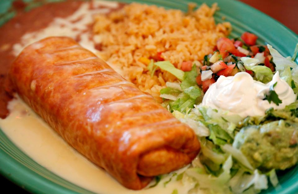 A chicken chimichanga from Los Laureles is technically a deep-fried burrito.