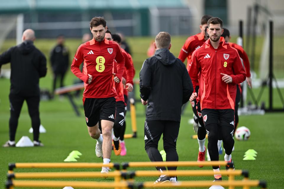 Ben Davies, left, trains at The Vale Resort in Glamorgan on Monday (Getty Images)