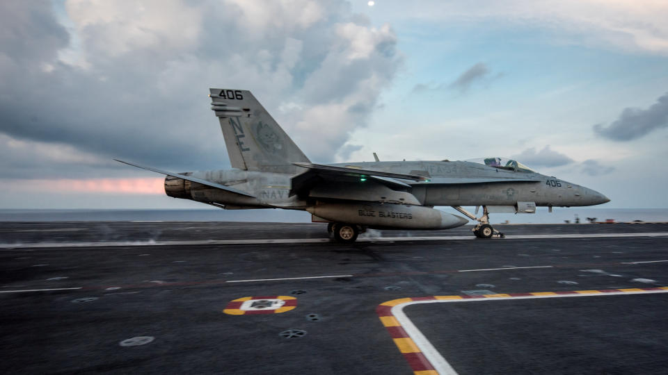 An F/A-18C Hornet from the Strike Fighter Squadron (VFA) 34 "Blue Blasters" launches from the aircraft carrier USS Carl Vinson (CVN 70) flight deck, in South China Sea April 8, 2017. Picture taken April 8, 2017. U.S. Navy photo by Mass Communication Specialist 3rd Class Matt Brown/Handout via REUTERS ATTENTION EDITORS - THIS IMAGE WAS PROVIDED BY A THIRD PARTY. EDITORIAL USE ONLY.