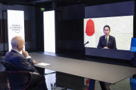 German Klaus Schwab, Founder and Executive Chairman of the World Economic Forum (WEF), listens Japanese Prime Minister Fumio Kishida displayed in screen during the Davos Agenda 2022, in Cologny near Geneva, Switzerland, Tuesday, Jan. 18, 2022. The Davos Agenda, from 17 to 21 January 2022, is an online edition due to the coronavirus disease (COVID-19) outbreak gather global leaders to shape the principles, policies and partnerships needed in this challenging context. (Salvatore Di Nolfi/Keystone via AP)