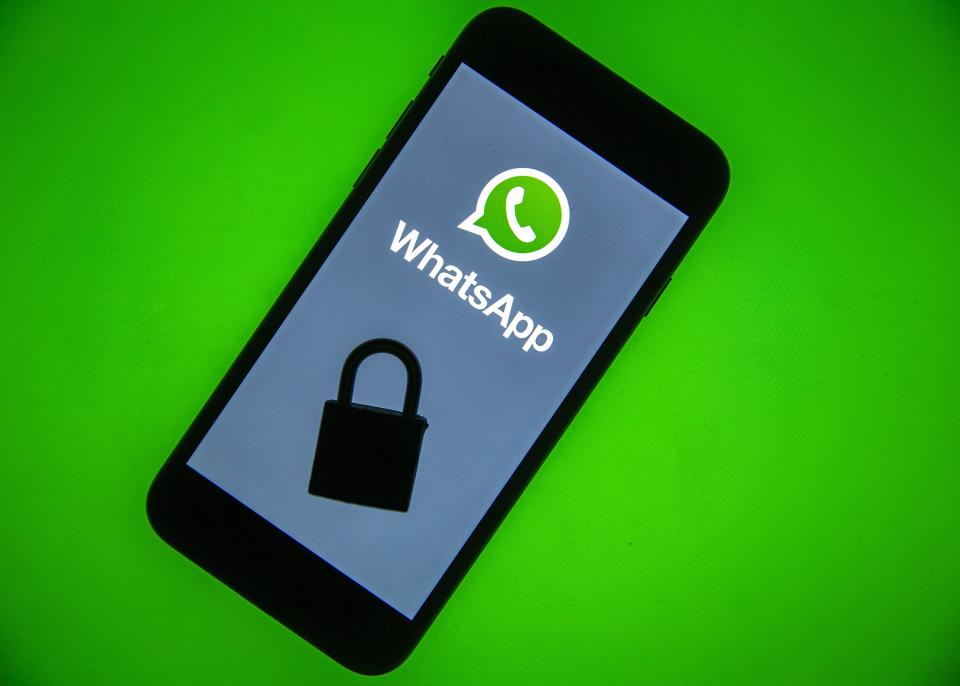 ANKARA, TURKEY - DECEMBER 10: WhatsApp logo is seen displayed on a smart phone screen with a padlock on it, in this illustration photo taken in Ankara, Turkey on December 10, 2019. (Photo by Ali Balikci/Anadolu Agency/Getty Images)