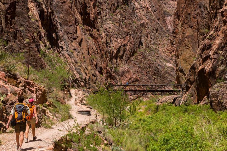 Visitors walk the North Kaibab trail in Grand Canyon National Park.