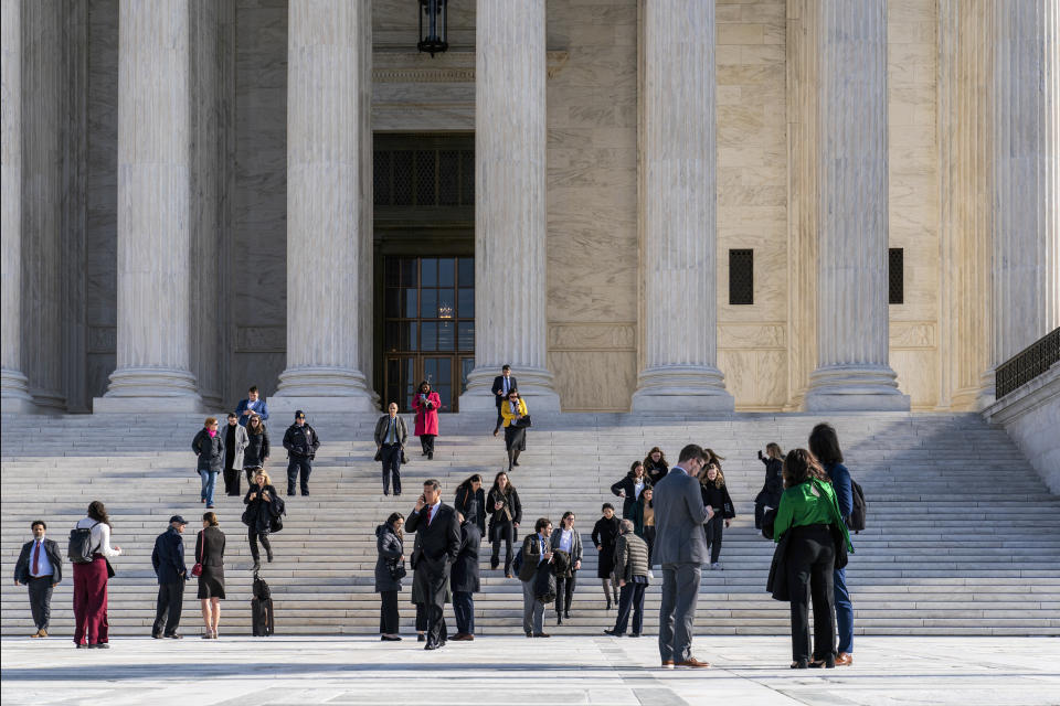 People leave the Supreme Court after oral arguments in Perez v. Sturgis Public Schools, Wednesday, Jan. 18, 2023, in Washington. (AP Photo/J. Scott Applewhite)