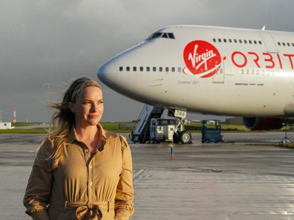 Melissa Thorpe, Head of Spaceport Cornwall, poses in front of Cosmic Girl, the modified Boeing 747 on November 08, 2022 in Newquay, England.