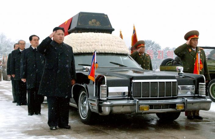 <div class="inline-image__caption"><p>Kim Jong Un salutes as he and his uncle Jang Song-thaek (3rd L) accompany the hearse carrying the coffin of Kim Jong Il during his funeral procession in Pyongyang on Dec. 28, 2011.</p></div> <div class="inline-image__credit">Kyodo/Reuters</div>