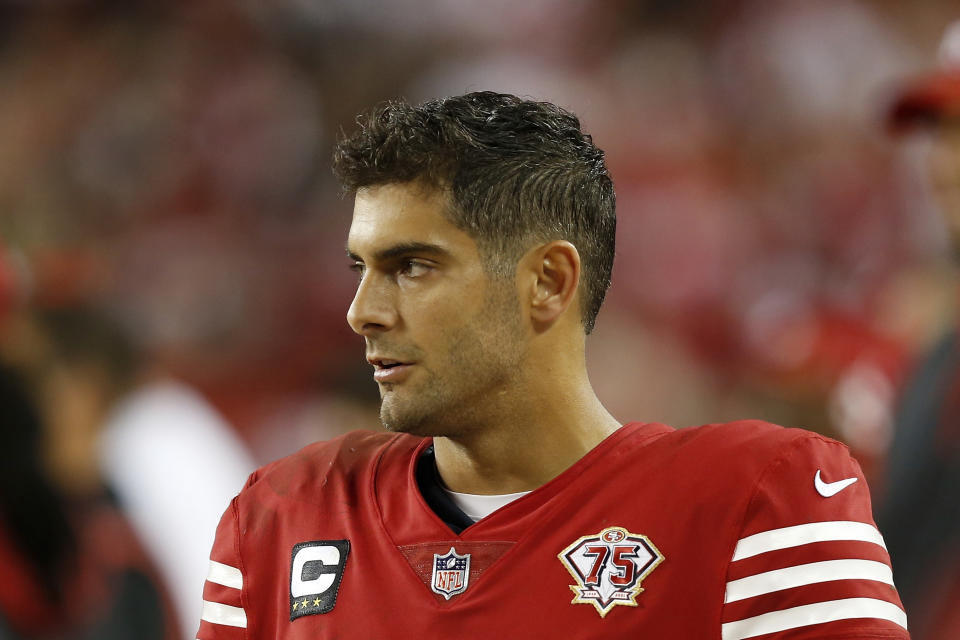 San Francisco 49ers quarterback Jimmy Garoppolo (10) looks on from the bench in the second half against the Green Bay Packers during an NFL football game, Sunday, Sep. 26, 2021 in Santa Clara, Calif. (AP Photo/Lachlan Cunningham)