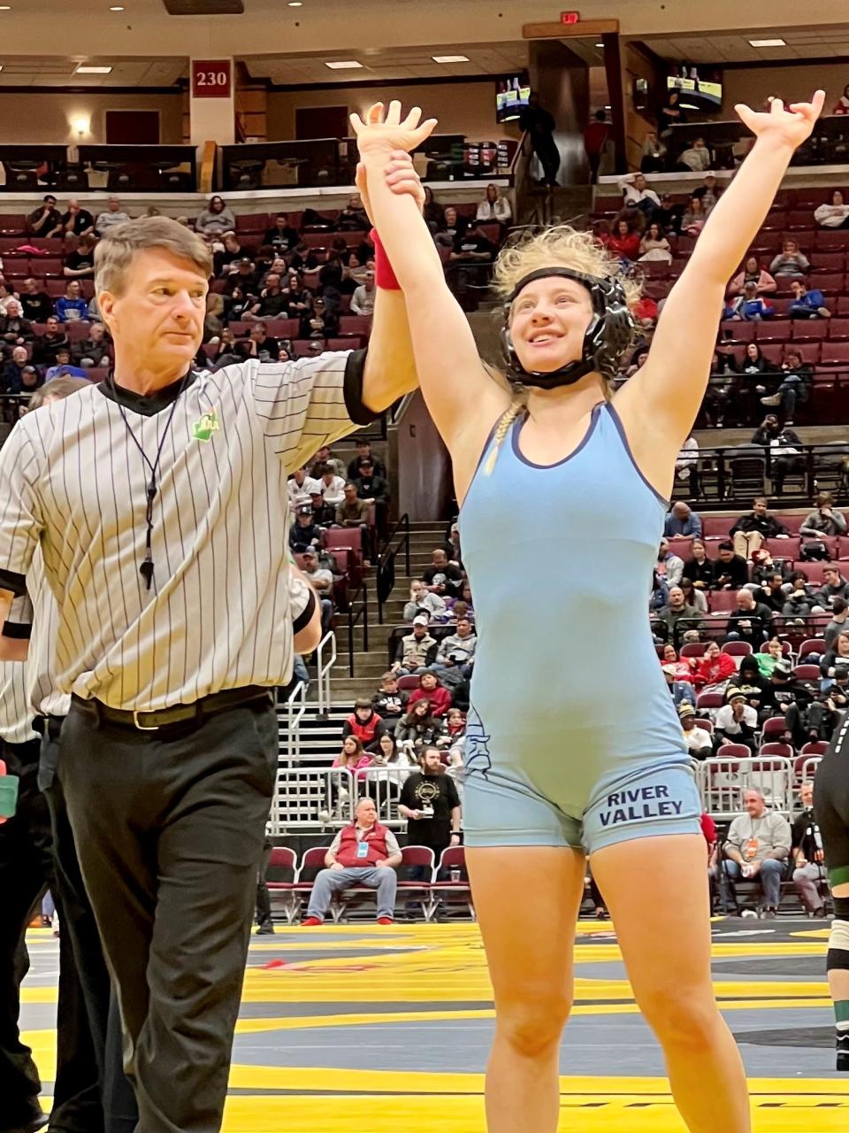 River Valley's Lila Mencer gets her hand raised during this year's state wrestling tournament, the first time girls performed at Ohio State's Schottenstein Center for state. She was named Fahey Bank Athlete of the Month for March among Marion County girls.