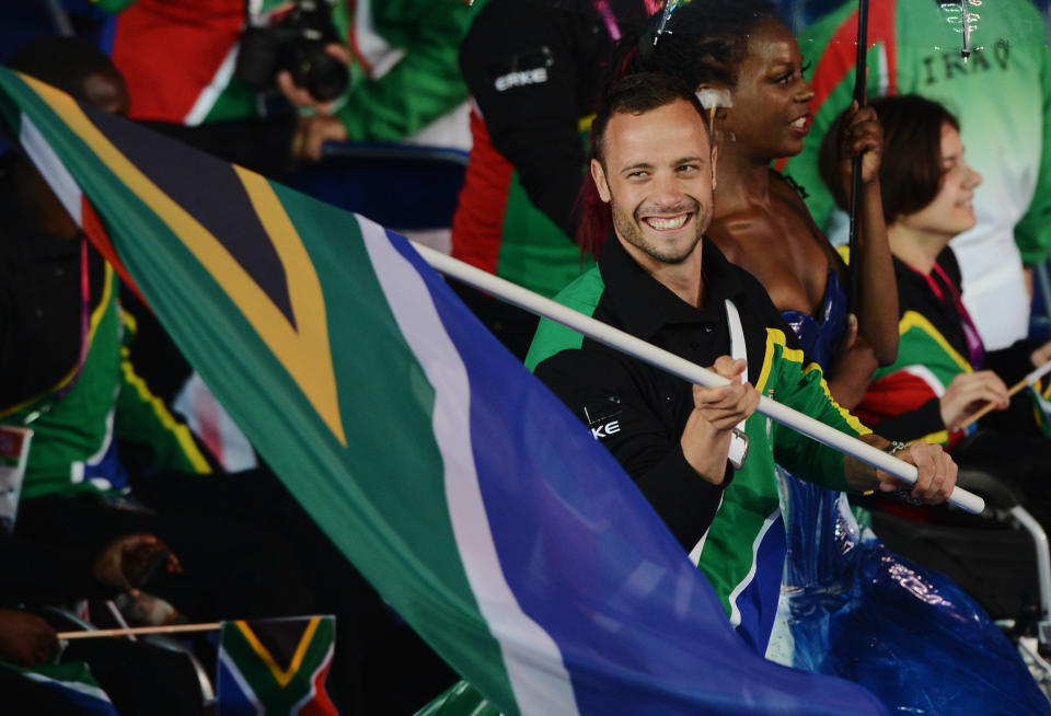 LONDON, ENGLAND - AUGUST 29: Athlete Oscar Pistorius of South Africa carries the flag during the Opening Ceremony of the London 2012 Paralympics at the Olympic Stadium on August 29, 2012 in London, England. (Photo by Gareth Copley/Getty Images)