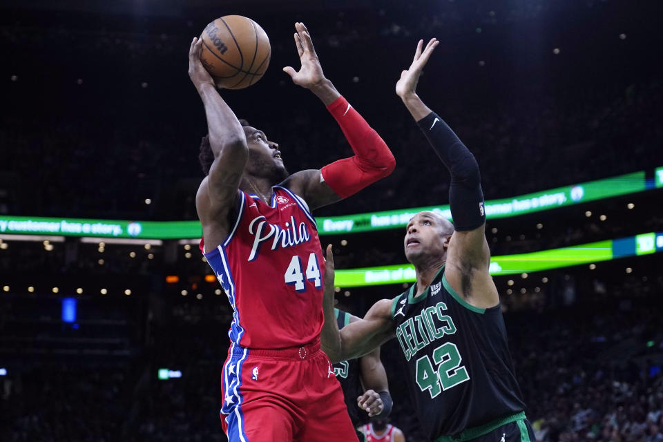 Philadelphia 76ers forward Paul Reed (44) shoots over Boston Celtics center Al Horford (42) during the first half of Game 1 in the NBA basketball Eastern Conference semifinals playoff series, Monday, May 1, 2023, in Boston. (AP Photo/Charles Krupa)