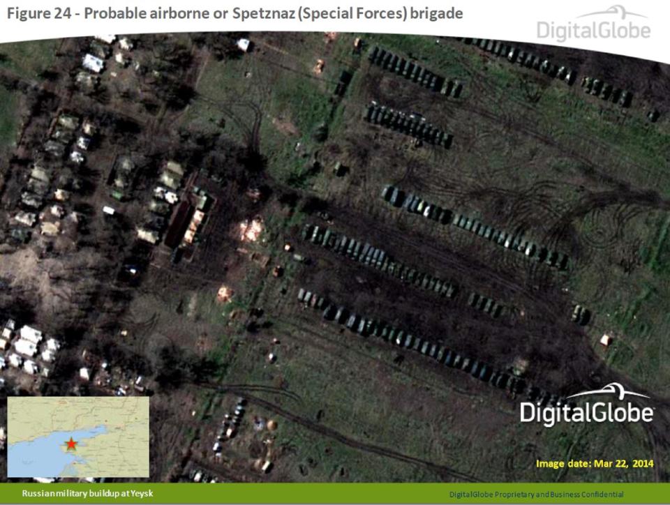 This satellite image made by DigitalGlobe on March 22, 2014, and provided by Supreme Headquarters Allied Powers Europe (SHAPE) on Tuesday, April 9, 2014, shows what is purported to be a Russian military airborne or Spetznaz (Special Forces) brigade at Yeysk, near the Sea of Azov in southern Russia. The image is one of several provided to the AP by NATO’s headquarters that show dozens of Russian tanks and other armored vehicles, combat jets and helicopter gunships stationed inside Russian territory near to the eastern border with Ukraine. AP cannot independently verify the authenticity or content of this image. (AP Photo/DigitalGlobe via SHAPE) MANDATORY CREDIT, NO CROPPING OR MODIFICATIONS ALLOWED