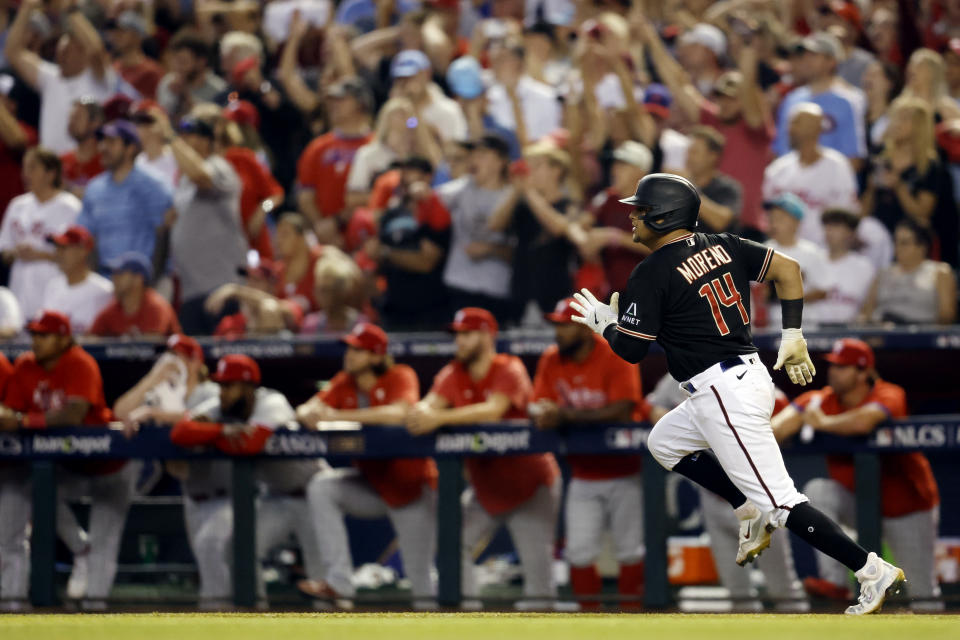 Gabriel Moreno of the Arizona Diamondbacks hits an RBI single in the eighth inning of Game 4 of the NLCS. (Chris Coduto/MLB Photos via Getty Images)